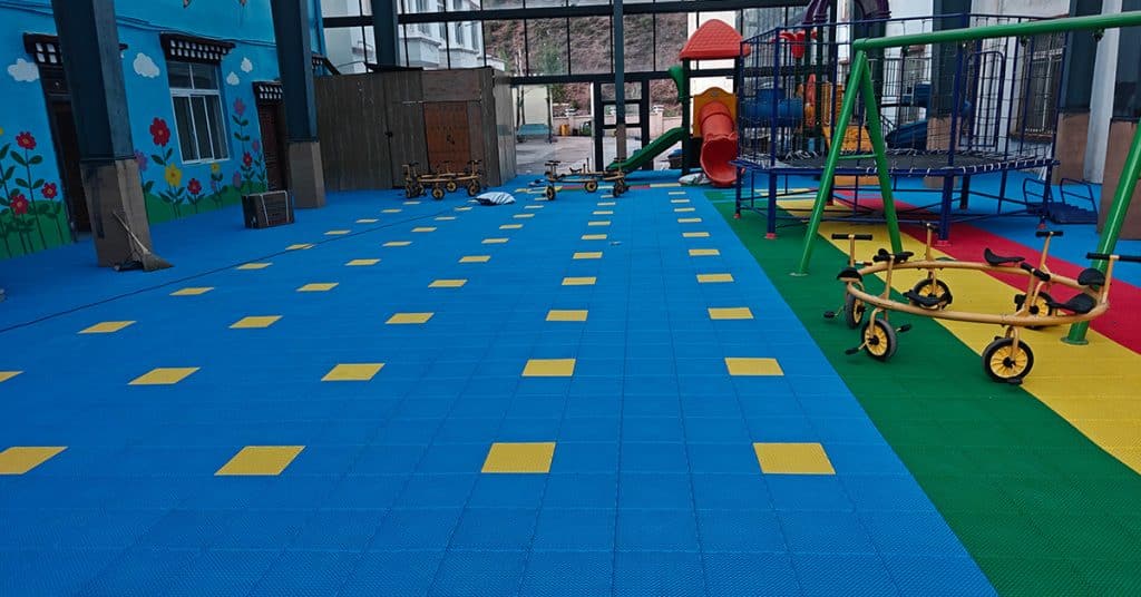 Mangkang Guoduo Kindergarten Playground Flooring Huasu_1200x628